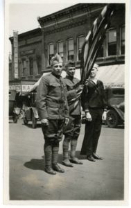 arne_winger_and_two_other_men_in_a_parade